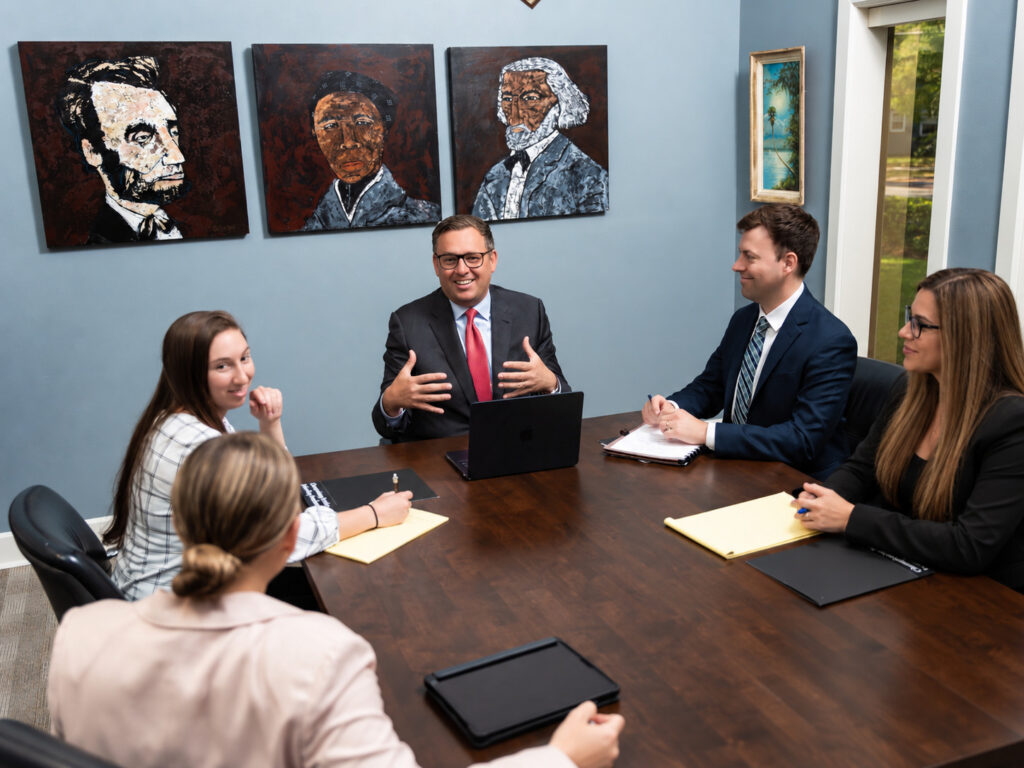 Jacob Stuart Law legal team meeting in the Orlando office